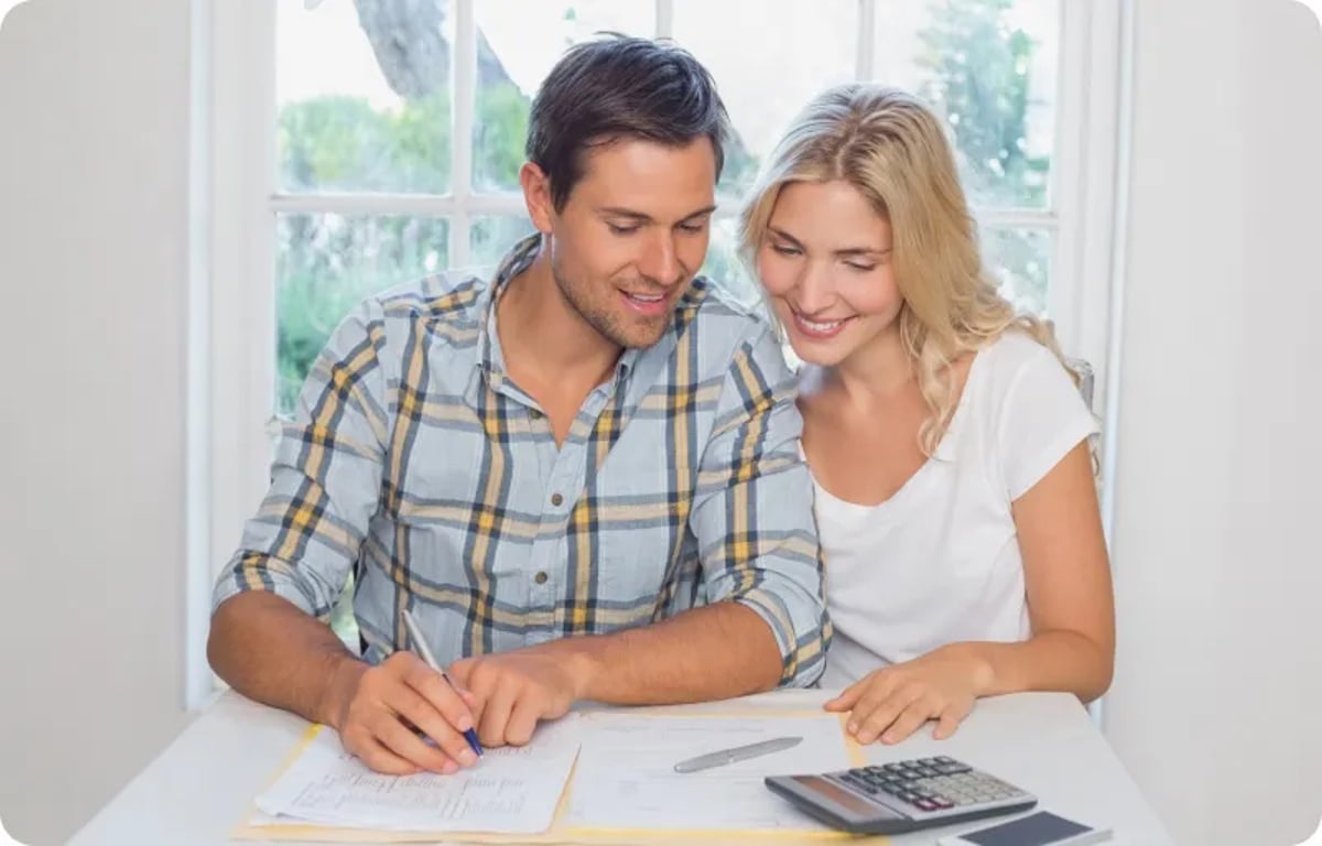 Two People Calculating Together