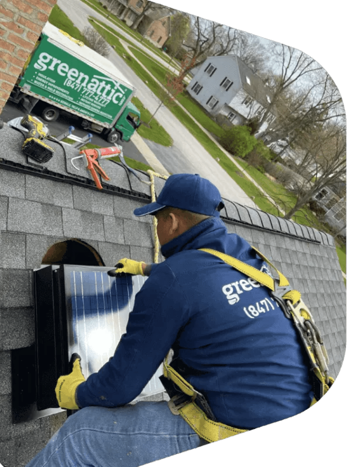 Green Attic Insulation Worker Installing Attic Fan