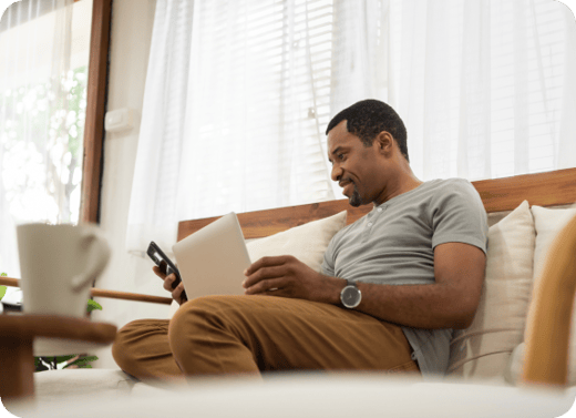 A-man-looking-at-laptop
