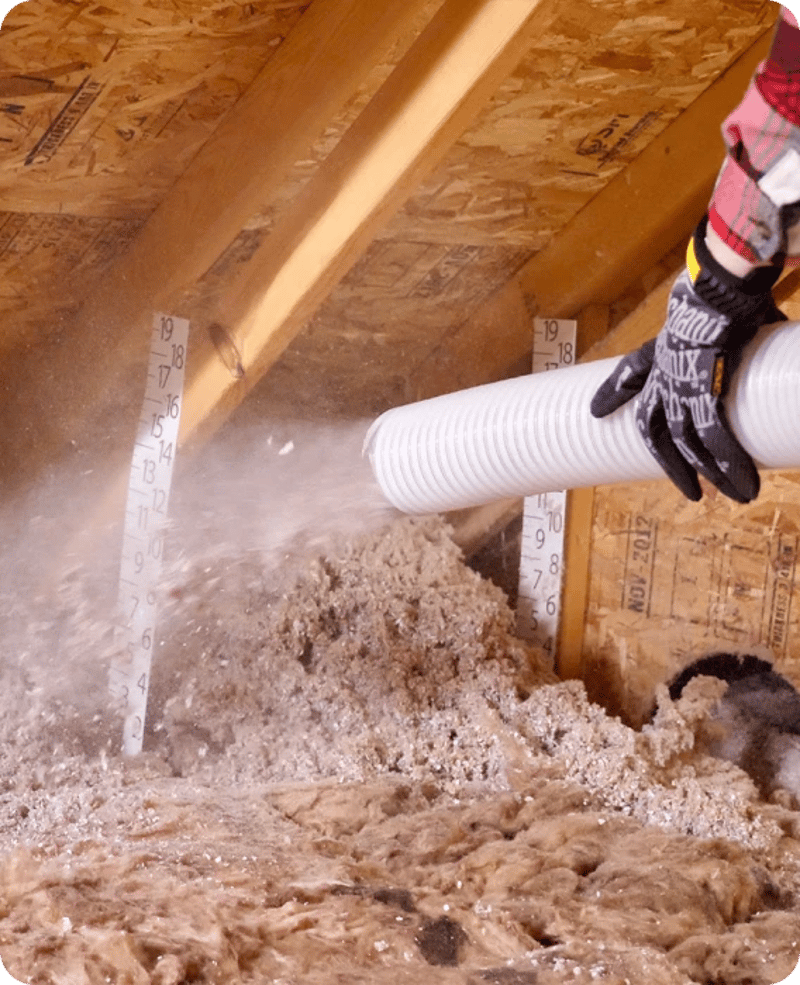 working in attic with insulation