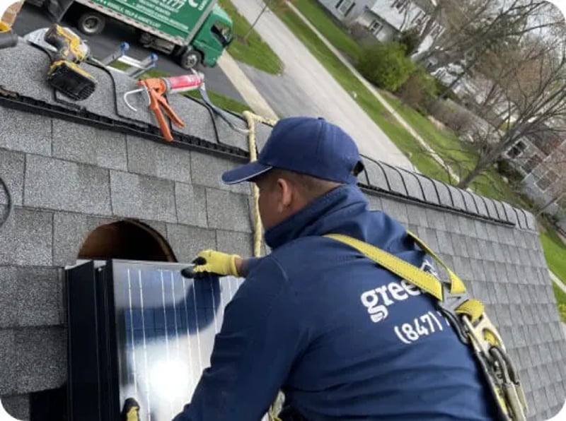 Green Attic Worker Installing Solar Fan